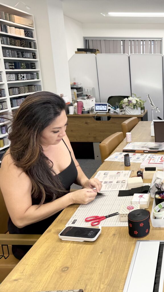 Mother and son enjoying a tatami-beri craft workshop in Osaka