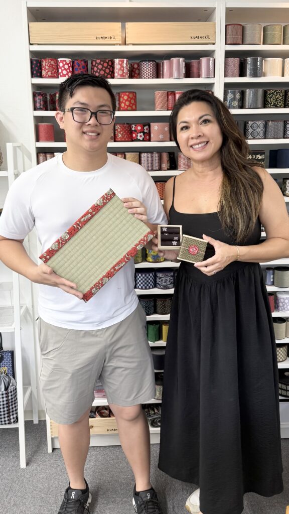 Mother and son enjoying a tatami-beri craft workshop in Osaka